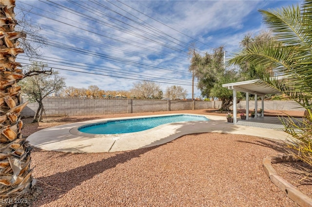 view of pool featuring a patio area, a fenced backyard, and a fenced in pool