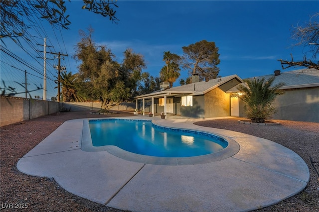 view of pool featuring a patio, a fenced backyard, and a fenced in pool