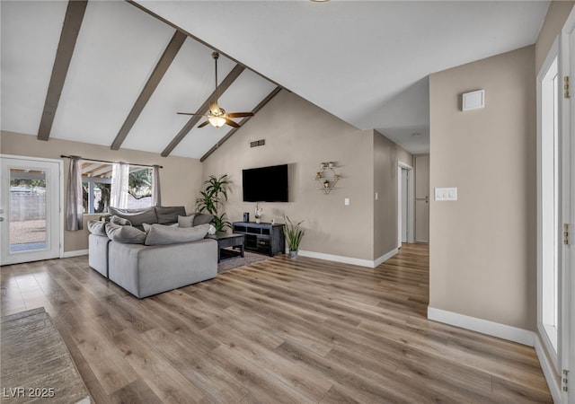 living area featuring high vaulted ceiling, wood finished floors, beam ceiling, and baseboards