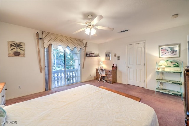 carpeted bedroom featuring visible vents and ceiling fan