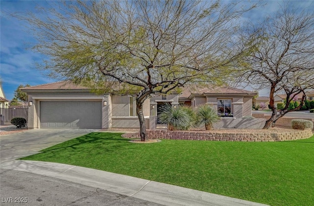 view of front facade with stucco siding, fence, a garage, driveway, and a front lawn