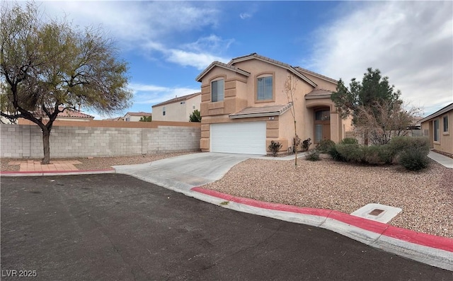 mediterranean / spanish-style house with driveway, a garage, a tile roof, fence, and stucco siding