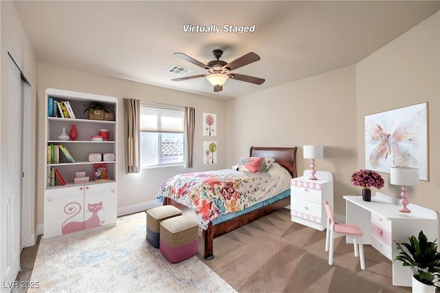 1332 Cedar Berry Ct, Henderson, NV 89012 - bedroom with baseboards, a ceiling fan, carpet, and a closet