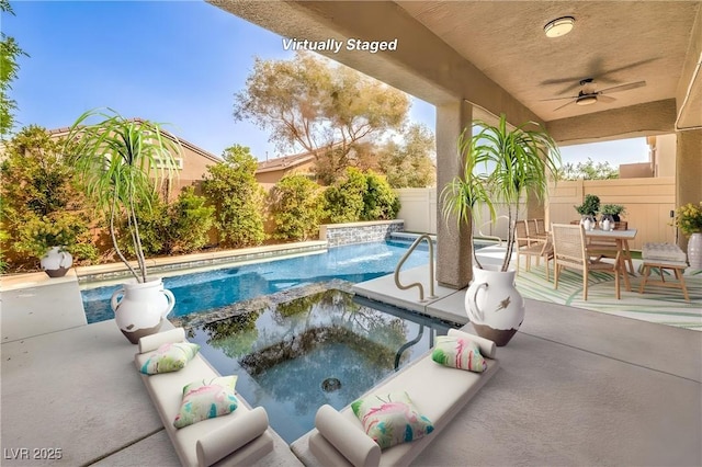 1332 Cedar Berry Ct, Henderson, NV 89012 - view of pool featuring a fenced backyard, ceiling fan, a pool with connected hot tub, outdoor dining area, and a patio