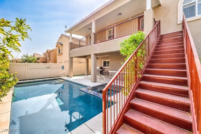 1332 Cedar Berry Ct, Henderson, NV 89012 - view of swimming pool featuring stairway, a pool with connected hot tub, and a patio