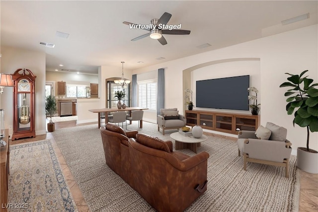 1332 Cedar Berry Ct, Henderson, NV 89012 - living area with a ceiling fan, a chandelier, and light tile patterned flooring