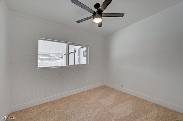 unfurnished room with light carpet, ceiling fan, and baseboards