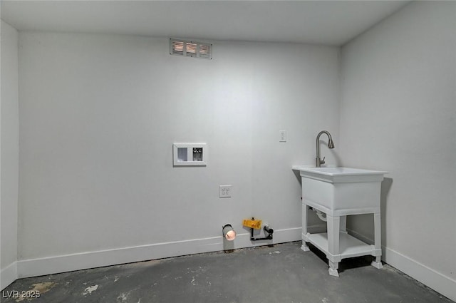 laundry room featuring laundry area, visible vents, and baseboards