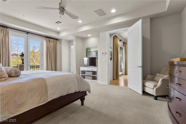 bedroom featuring visible vents, baseboards, light colored carpet, access to outside, and recessed lighting