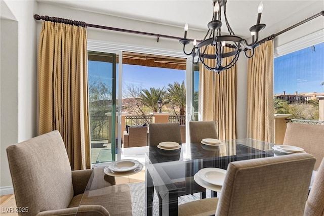 dining area featuring an inviting chandelier