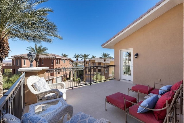 balcony featuring a residential view