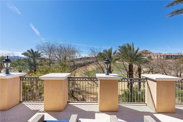 view of patio with a balcony