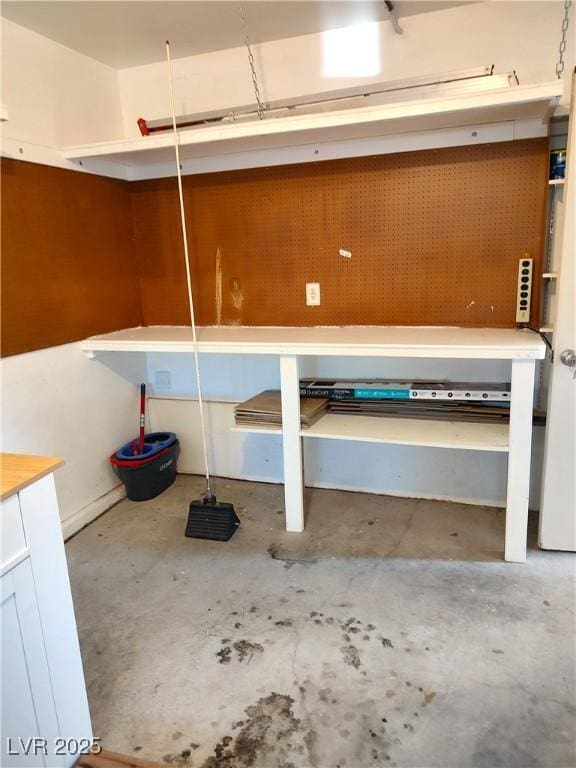 garage featuring a workshop area