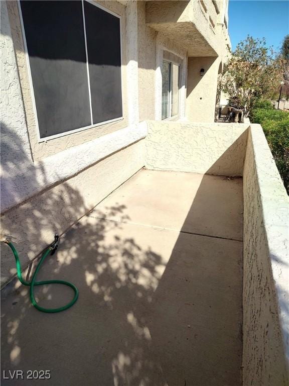 view of patio / terrace with a balcony