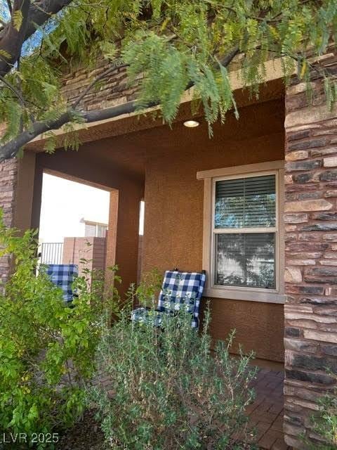 view of side of property with stucco siding