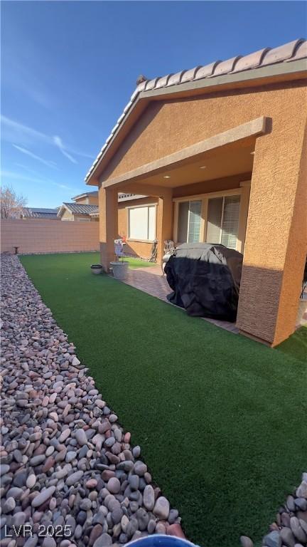 view of yard with fence