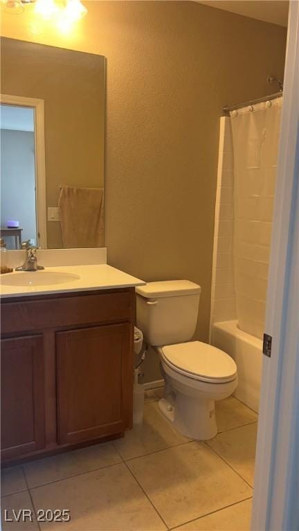 full bath featuring toilet, tile patterned floors, and vanity