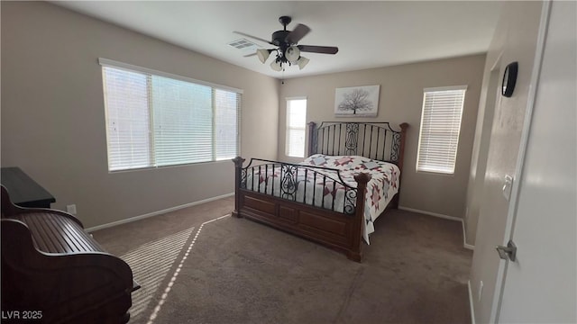 bedroom with a ceiling fan, carpet, visible vents, and baseboards