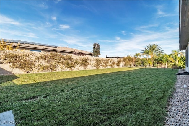 view of yard with fence