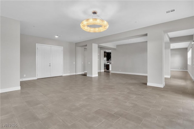 interior space featuring visible vents and baseboards