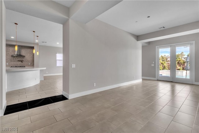 unfurnished living room with recessed lighting, visible vents, baseboards, and light tile patterned flooring