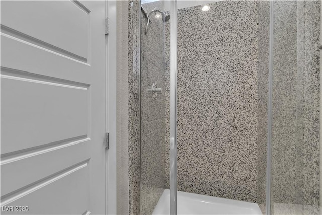 bathroom featuring a stall shower