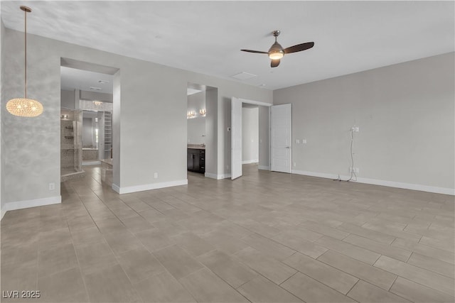 interior space featuring ceiling fan, stairway, visible vents, and baseboards