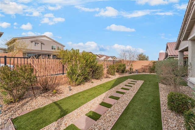 view of yard featuring a fenced backyard