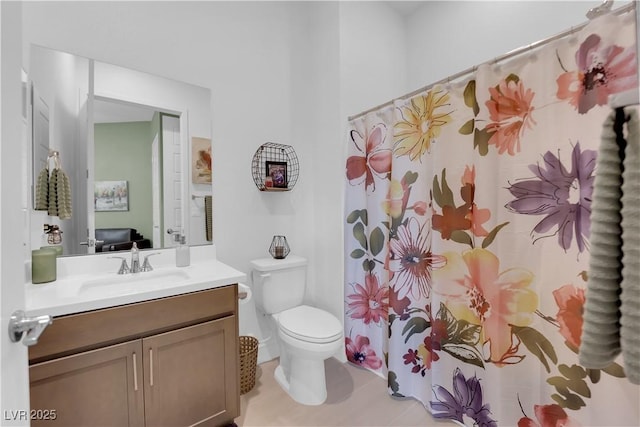 full bathroom with toilet, curtained shower, and vanity