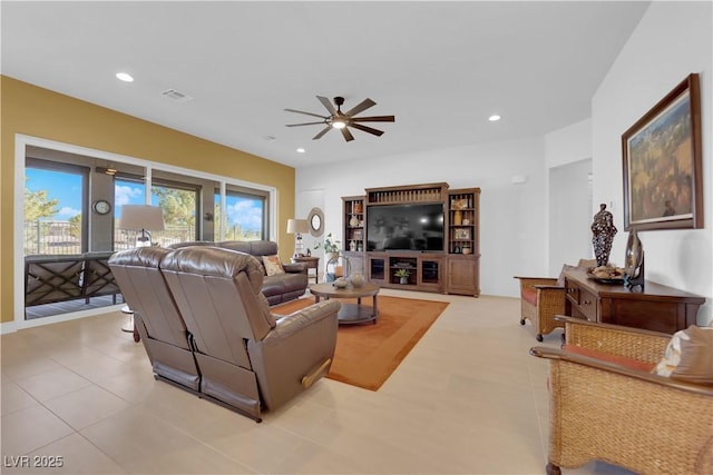 living area featuring recessed lighting, visible vents, ceiling fan, and tile patterned floors