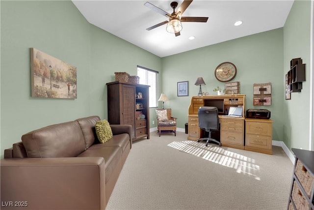 office featuring light carpet, ceiling fan, baseboards, and recessed lighting