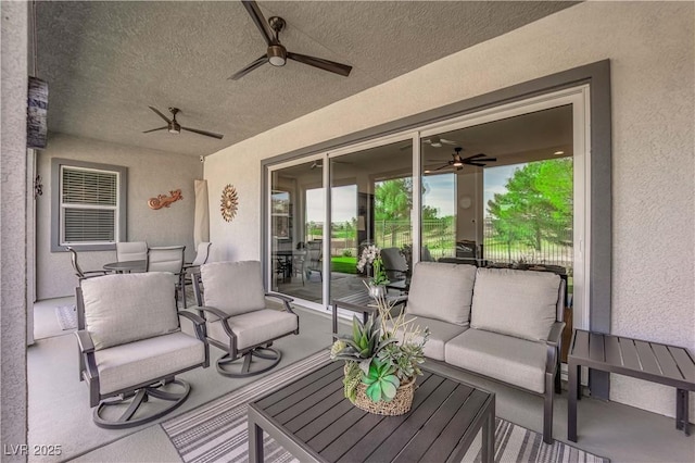 exterior space featuring ceiling fan and an outdoor living space