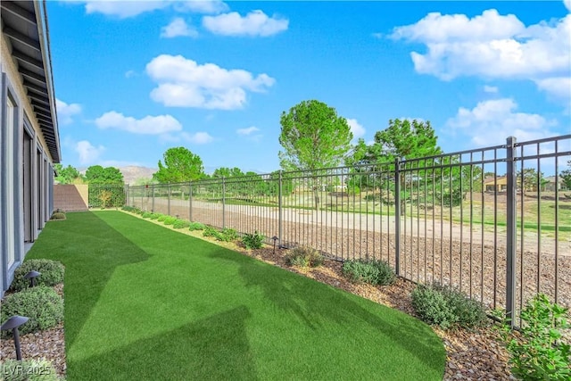 view of yard featuring a fenced backyard