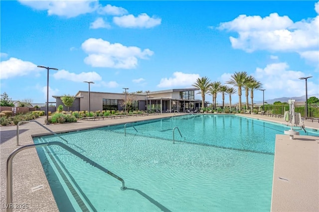 community pool featuring a patio area