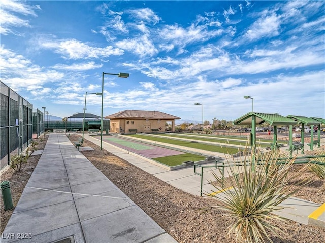 surrounding community featuring fence