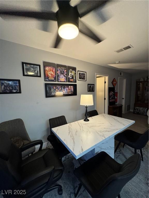 home office featuring ceiling fan and visible vents