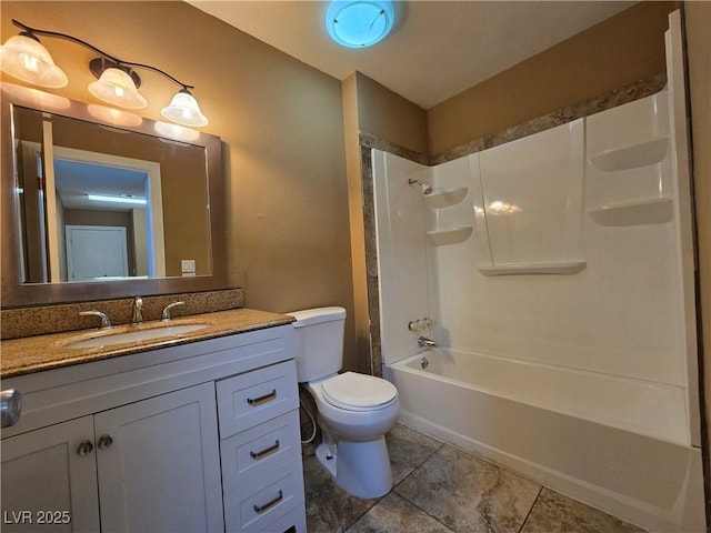 bathroom with shower / bath combination, vanity, and toilet