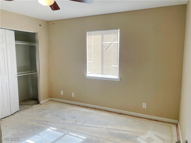 unfurnished bedroom featuring ceiling fan, baseboards, and a closet