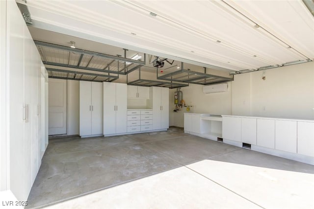 garage with a garage door opener and water heater