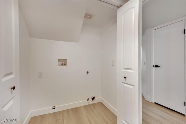 laundry room with laundry area, light wood finished floors, gas dryer hookup, and hookup for a washing machine