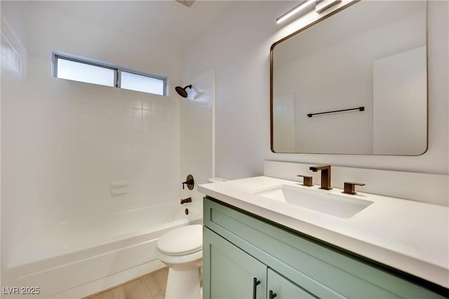 full bathroom with shower / bath combination, vanity, and toilet