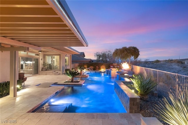 view of swimming pool with a ceiling fan, fence, a fenced in pool, and a patio