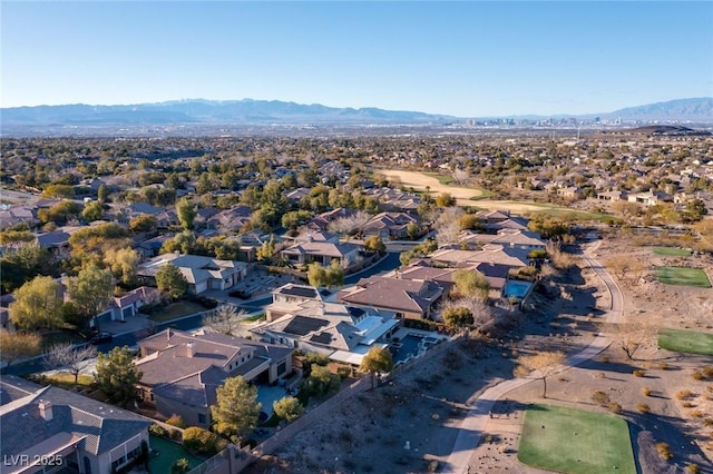 aerial view with a mountain view and a residential view