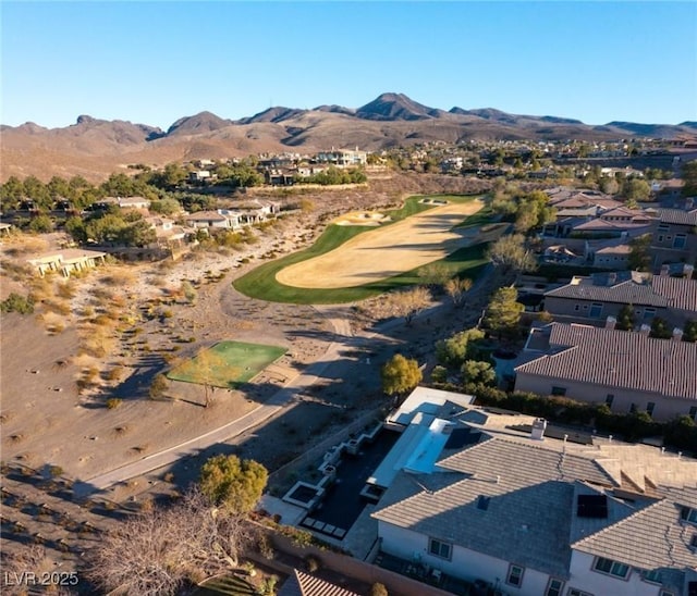 birds eye view of property featuring a mountain view