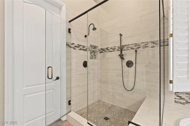 bathroom featuring a stall shower