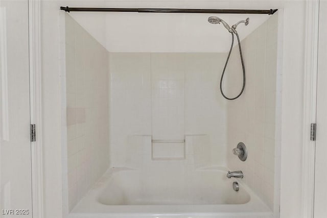 bathroom with washtub / shower combination