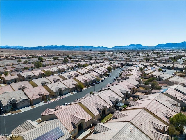 drone / aerial view with a mountain view and a residential view