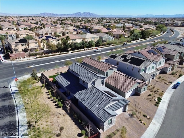 drone / aerial view with a mountain view and a residential view