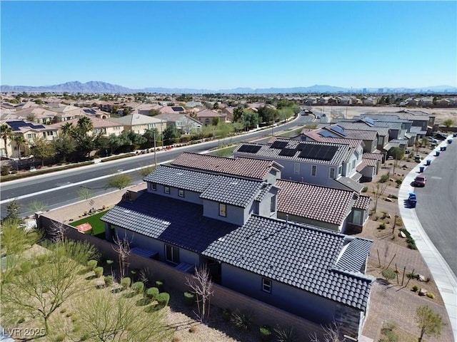 bird's eye view with a residential view and a mountain view