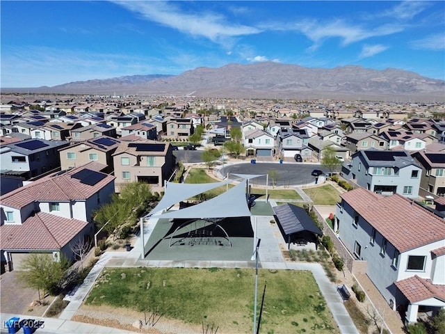 aerial view featuring a mountain view and a residential view